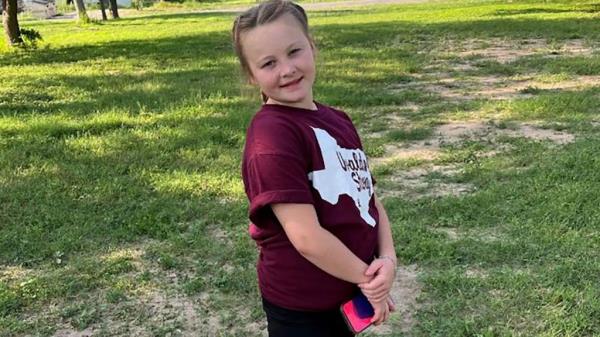 Khloie Torres, a girl standing in a field, who survived the Robb Elementary School shooting