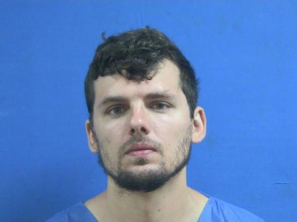 Zachary Mowel mugshot with blue background