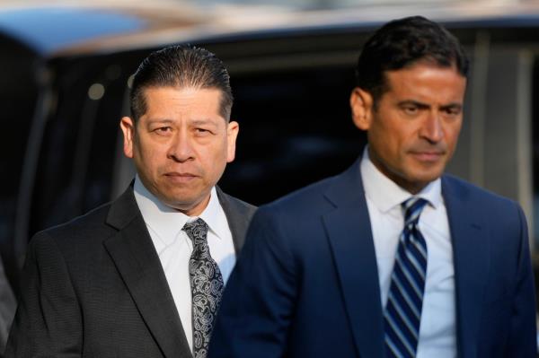 Former Uvalde Co<em></em>nsolidated Independent School District police officer Adrian Go<em></em>nzales (left) is facing multiple felony charges co<em></em>nnected to the shooting.