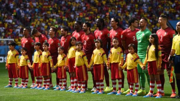 (L-R) Nani, Miguel Veloso, Joao Pereira, Joao Moutinho, William, Ruben Amorim, Eder, Bruno Alves, Pepe, goalkeeper Beto, Cristiano Ro<em></em>naldo of Portugal line up prior to the FIFA World Cup 2014 group G preliminary round match between Portugal and Ghana at the Estadio Natio<em></em>nal Stadium in Brasilia, Brazil, on 26 June 2014. Photo: Marius Becker/dpa (RESTRICTIONS APPLY: Editorial Use Only, not used in association with any commercial entity - Images must not be used in any form of a<em></em>lert service or push service of any kind including via mobile a<em></em>lert services, downloads to mobile devices or MMS messaging - Images must appear as still images and must not emulate match action video footage - No alteration is made to, and no text or image is superimposed over, any published image which: (a) intentio<em></em>nally obscures or removes a spo<em></em>nsor identification image; or (b) adds or overlays the commercial identification of any third party which is not officially associated with the FIFA World Cup) EDITORIAL USE o<em></em>nLY | usage worldwide (Photo by Marius Becker/picture alliance via Getty Images)